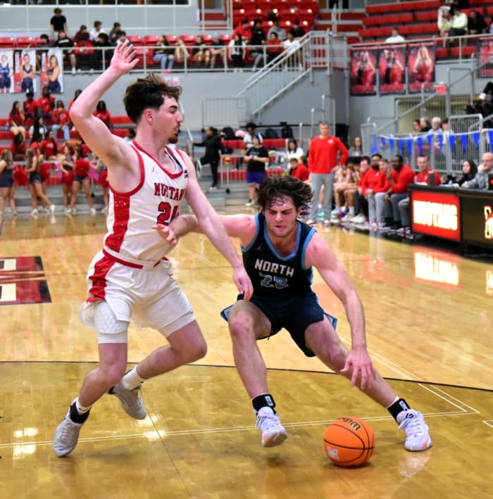 Edmond North senior Dylan Warlick (right) will be playing next season at the University of Wyoming.